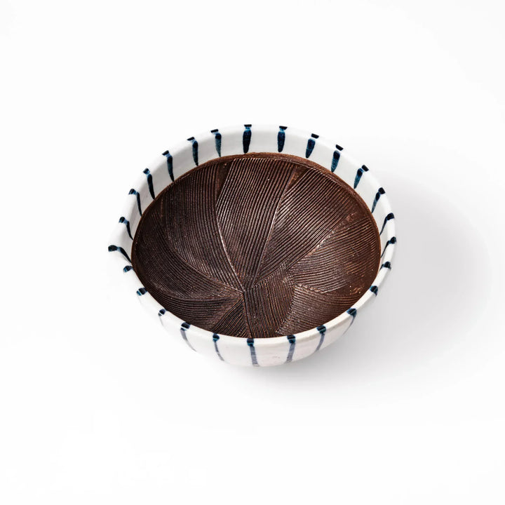 White ceramic suribachi mortar with vertical blue stripes and a textured brown interior, ideal for grinding sesame seeds and traditional Japanese seasonings.