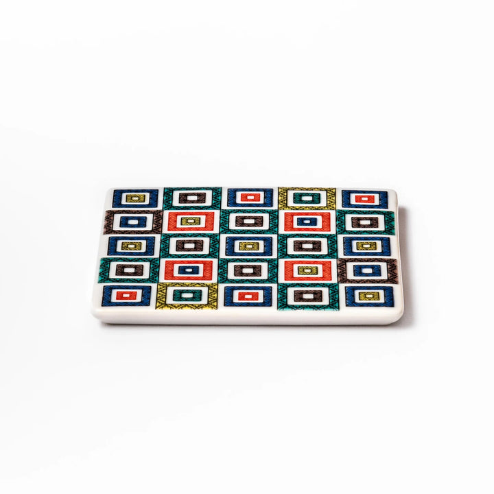 Square Japanese ceramic coaster with colorful cobblestone mosaic pattern in red, blue, green, yellow, and black, ideal for stylish table settings.