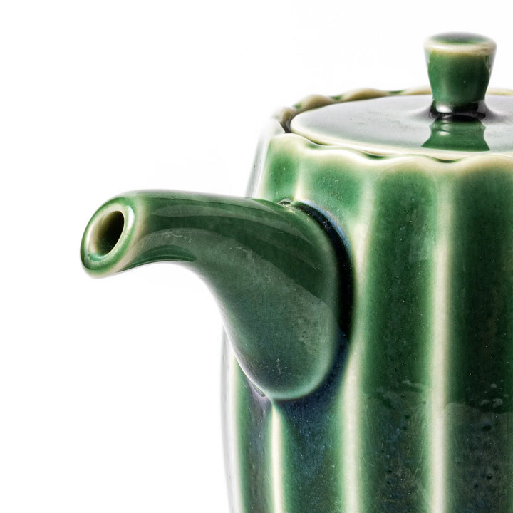 Elegant Mino ware soy sauce dispenser with a forest-inspired green glaze and drip-resistant spout. A perfect blend of tradition, function, and beauty.