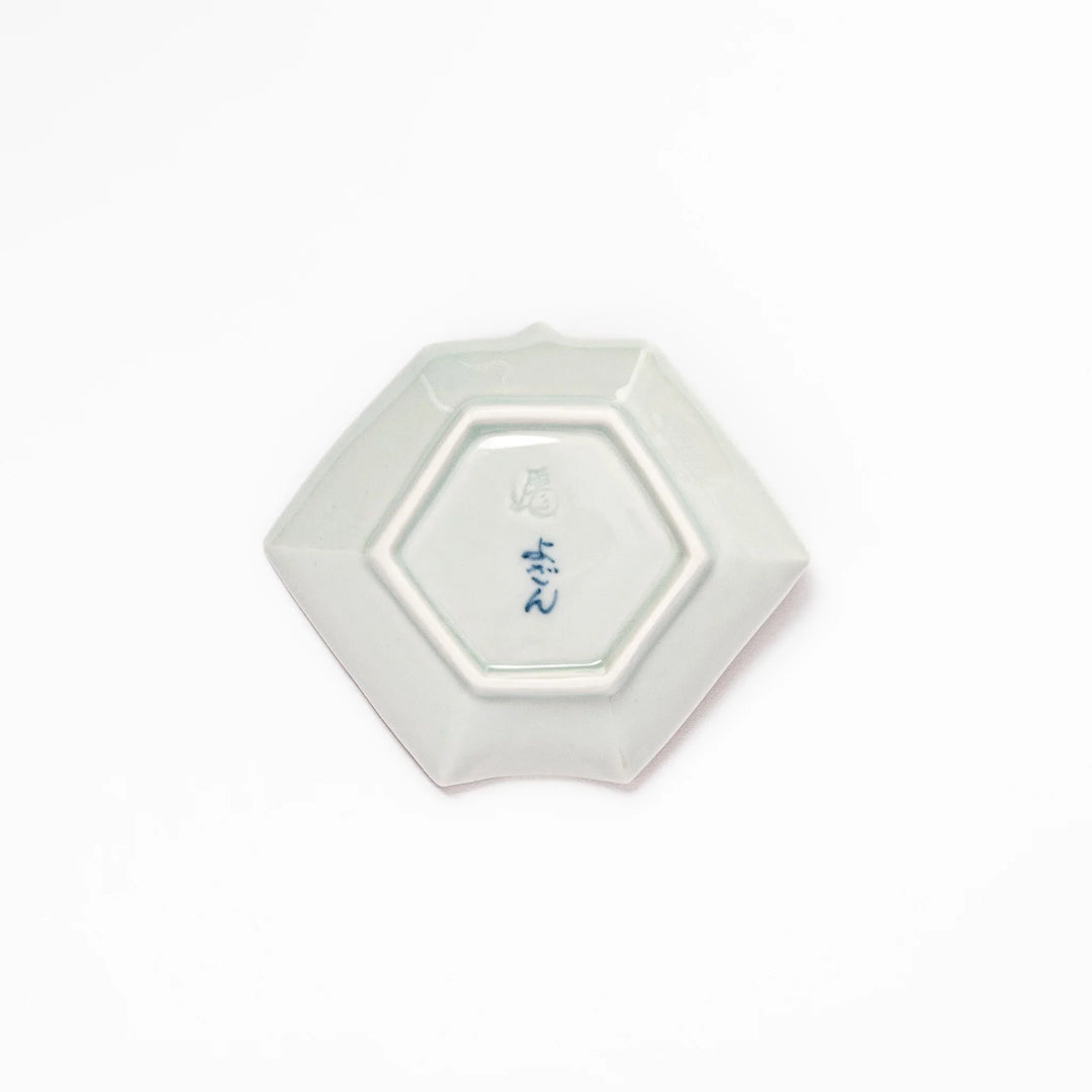 Japanese porcelain origami-shaped sauce dish with geometric circle and floral motifs, handcrafted in Japan for soy sauce, condiments, or appetizers