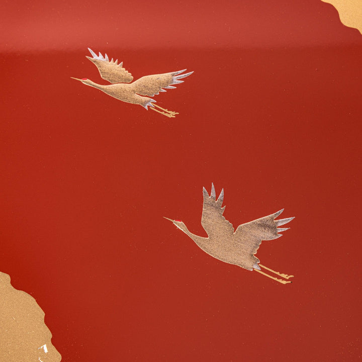 Gold River & Crane Japanese Jubako Box in hexagonal form with gold river and crane motif on vermilion red lacquer, perfect for festive food presentation.