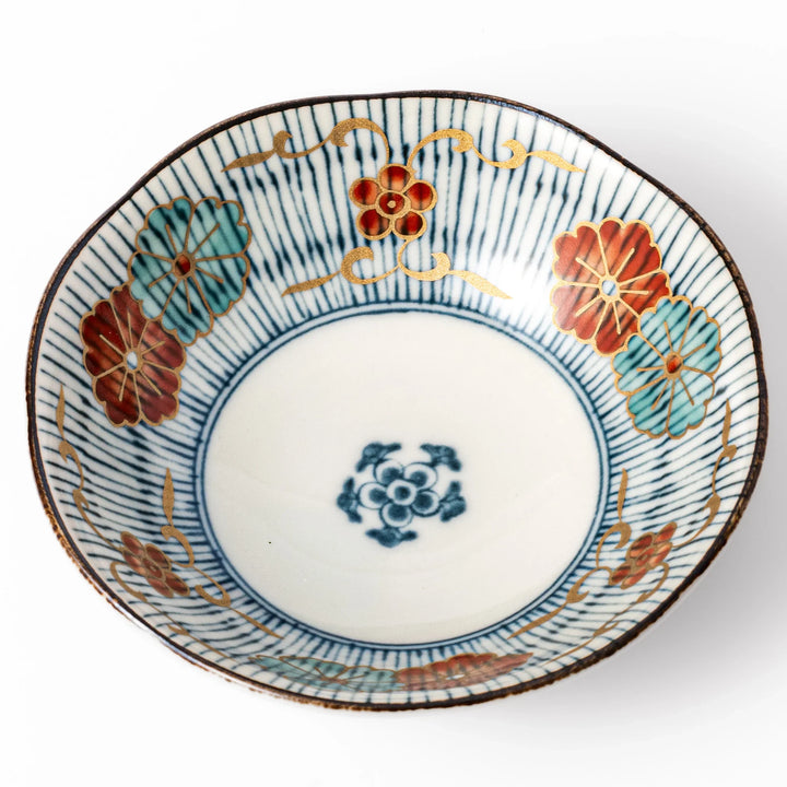 Scalloped Japanese dessert bowl with blue stripes, red and teal floral motifs, and gold accents—perfect for traditional sweets or small side dishes.