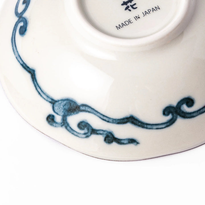 Scalloped Japanese dessert bowl with blue stripes, red and teal floral motifs, and gold accents—perfect for traditional sweets or small side dishes.