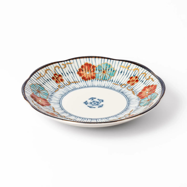 Scalloped Japanese dessert plate with vertical blue stripes and red, teal, and gold floral accents, perfect for serving sweets or small treats in style.