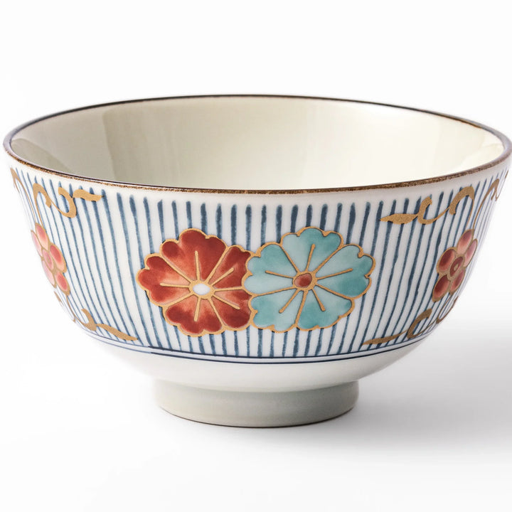 Traditional Japanese rice bowl with vertical blue stripes and red, teal, and gold floral designs, perfect for brightening up everyday meals.