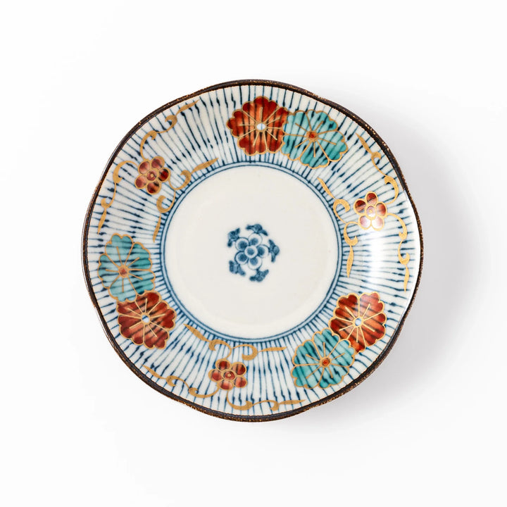 Scalloped edge Japanese sauce dish with vertical blue stripes and red, teal, and gold floral motifs, ideal for serving condiments with elegance.