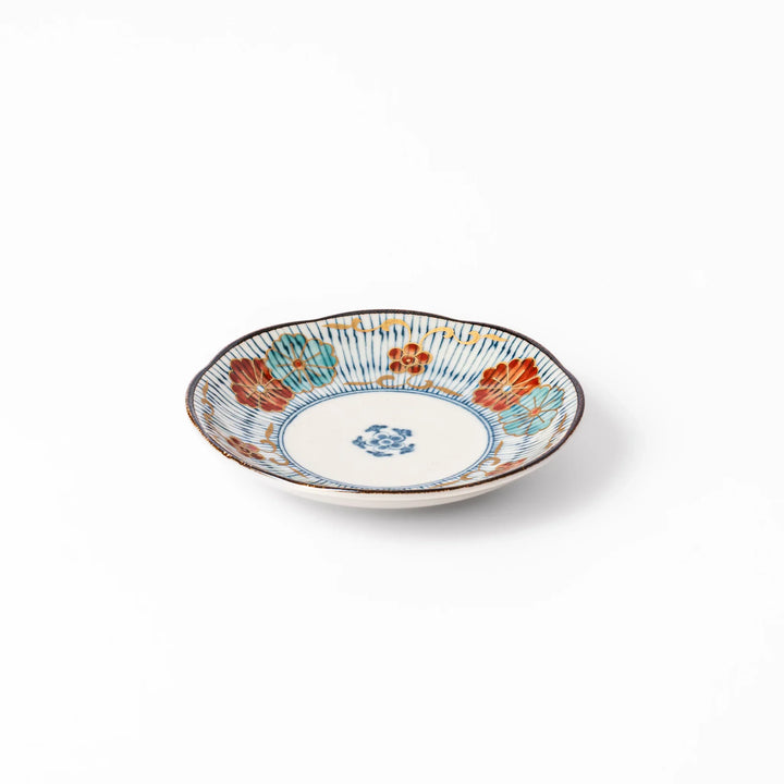 Scalloped edge Japanese sauce dish with vertical blue stripes and red, teal, and gold floral motifs, ideal for serving condiments with elegance.