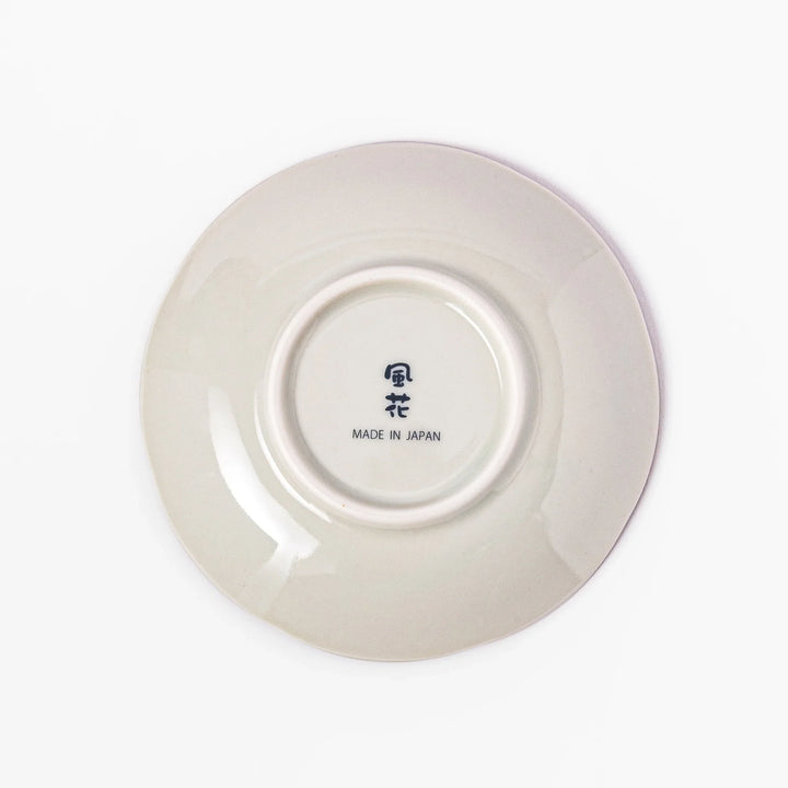 Scalloped edge Japanese sauce dish with vertical blue stripes and red, teal, and gold floral motifs, ideal for serving condiments with elegance.