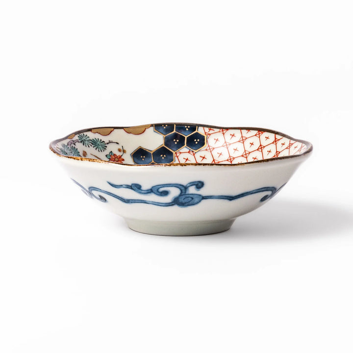 Scalloped Japanese dessert bowl with vibrant floral designs, red lattice, and navy hexagon accents, perfect for traditional sweets or small side dishes.