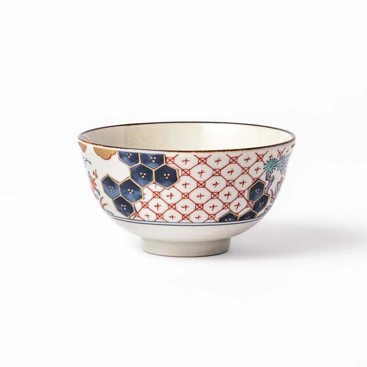 Traditional Japanese rice bowl featuring red lattice, navy hexagons, and multicolor floral motifs, perfect for adding elegance to everyday meals.