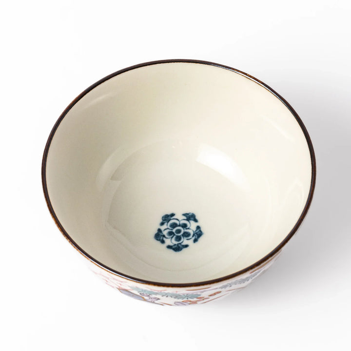 Traditional Japanese rice bowl featuring red lattice, navy hexagons, and multicolor floral motifs, perfect for adding elegance to everyday meals.