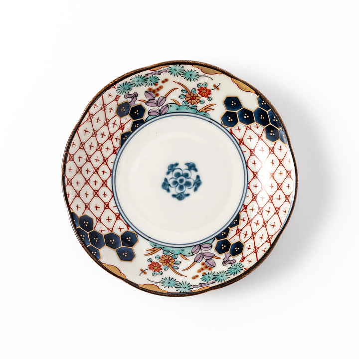 Scalloped Japanese sauce dish with red lattice, floral motifs, and navy hexagon accents, perfect for adding charm to traditional table settings.