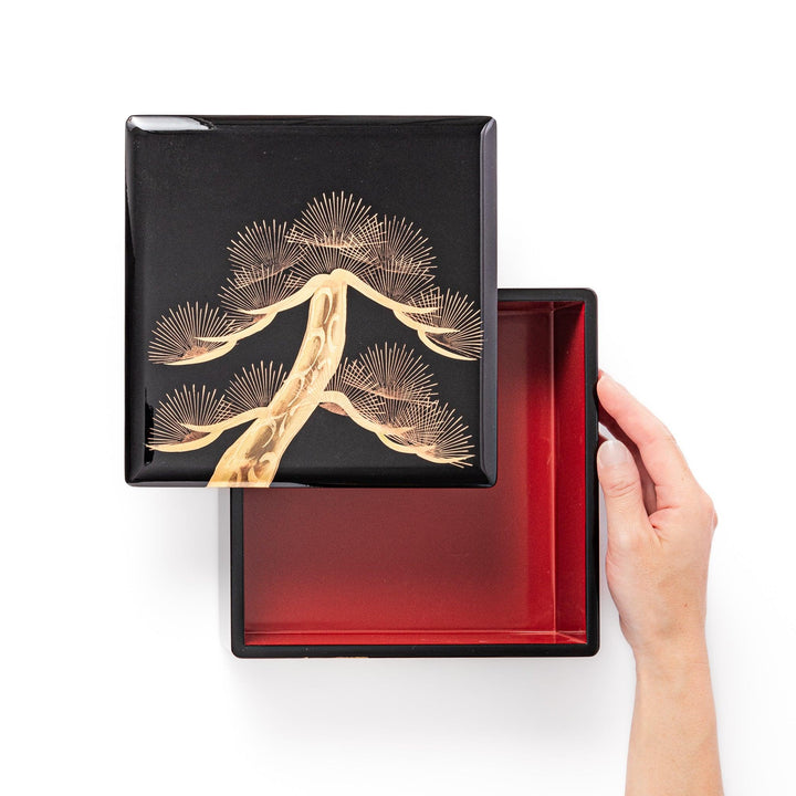 Interior view of the Golden Pine Japanese Jubako Box, revealing three red-lacquered tiers and lid with gold pine tree design, ideal for elegant food presentation.