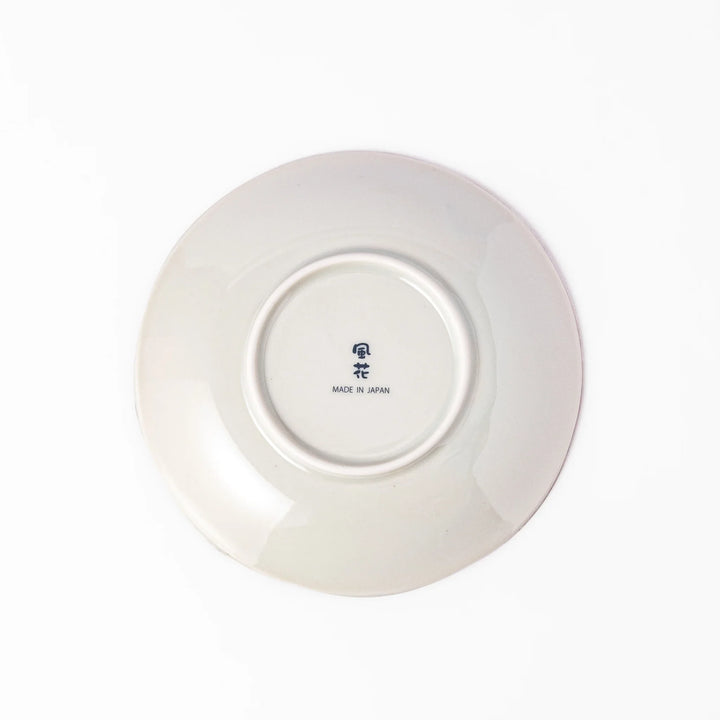 Elegant Japanese dessert plate with a scalloped edge, blue floral center, and red, gold, and green traditional patterns perfect for refined table settings.