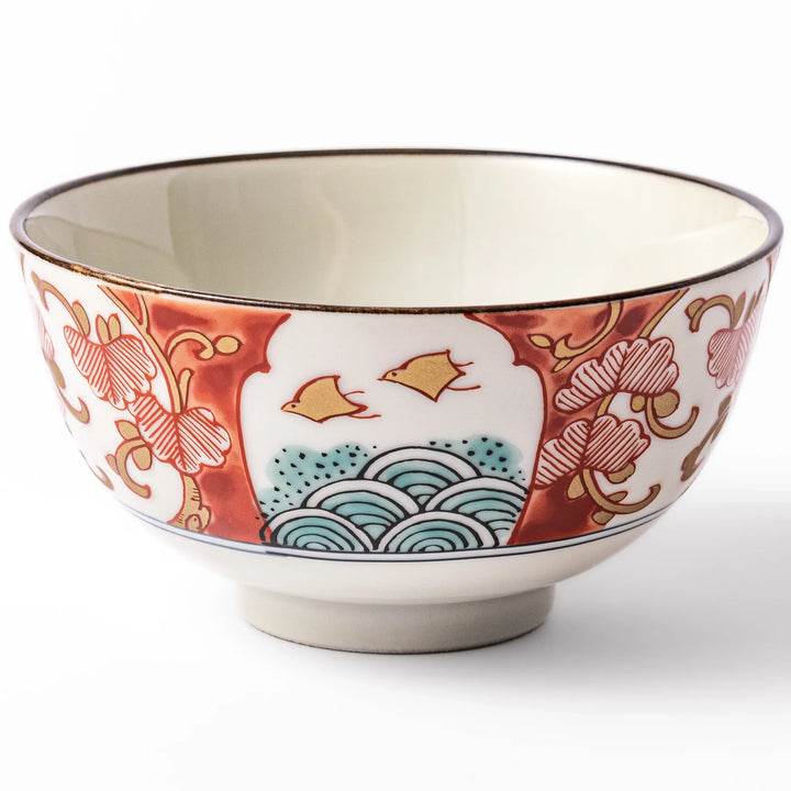 Traditional Japanese rice bowl featuring red, green, and gold motifs with waves, florals, and flying birds—perfect for refined, elegant dining.