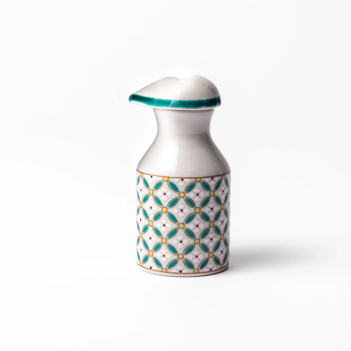Japanese ceramic soy sauce dispenser with elegant geometric blossom pattern in teal, gold, and red accents, adding a refined traditional touch to dining tables.