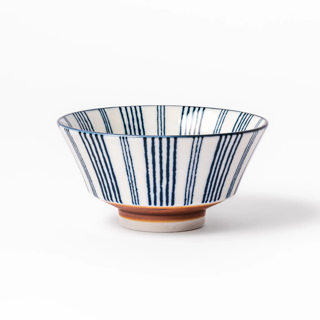 Japanese porcelain rice bowl with fine indigo vertical stripes and natural terracotta base, handcrafted in classic minimalist style.