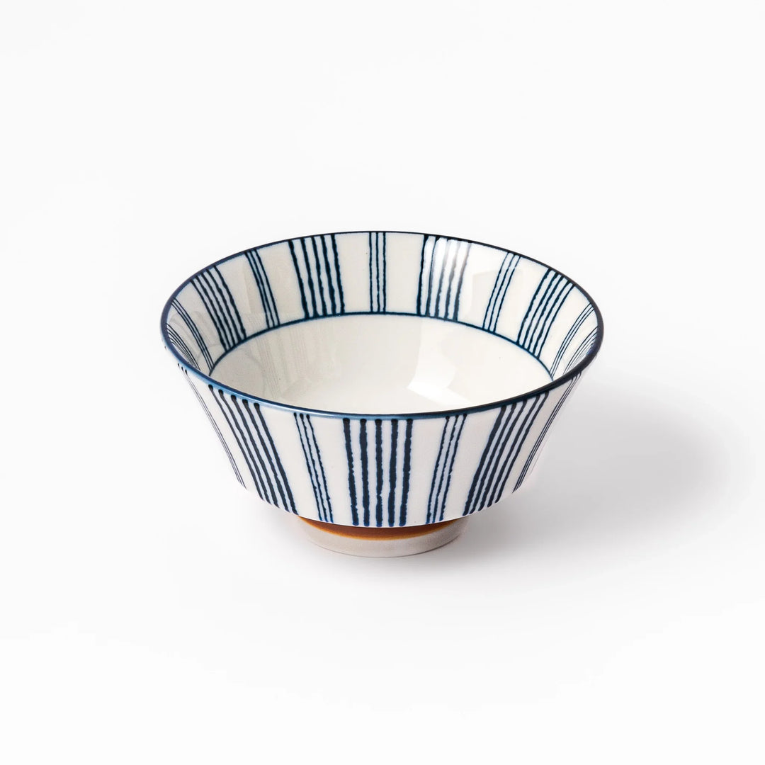 Japanese porcelain rice bowl with fine indigo vertical stripes and natural terracotta base, handcrafted in classic minimalist style.