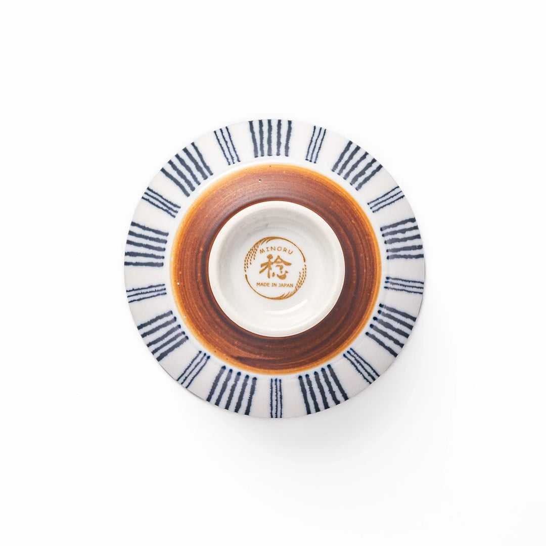 Japanese porcelain rice bowl with fine indigo vertical stripes and natural terracotta base, handcrafted in classic minimalist style.