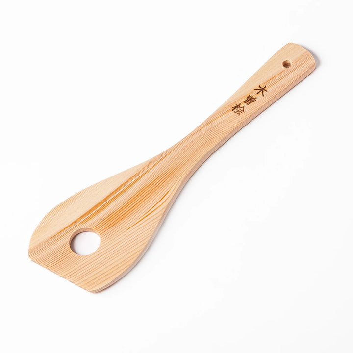 Hinoki wood slotted spatula with a circular cut-out and engraved handle, ideal for stirring and draining while adding a traditional Japanese touch.