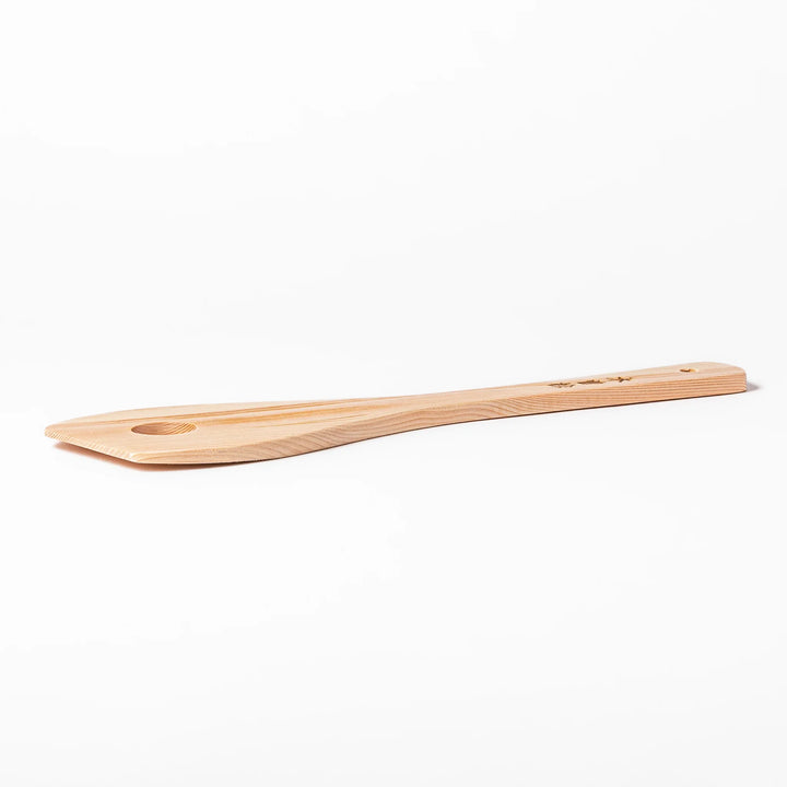 Hinoki wood slotted spatula with a circular cut-out and engraved handle, ideal for stirring and draining while adding a traditional Japanese touch.