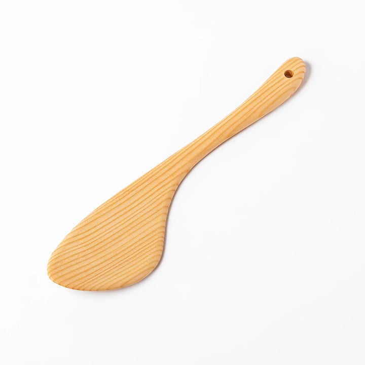Curved spatula crafted from natural hinoki wood, featuring a wide paddle and smooth grain, perfect for stir-frying and gentle cooking tasks.