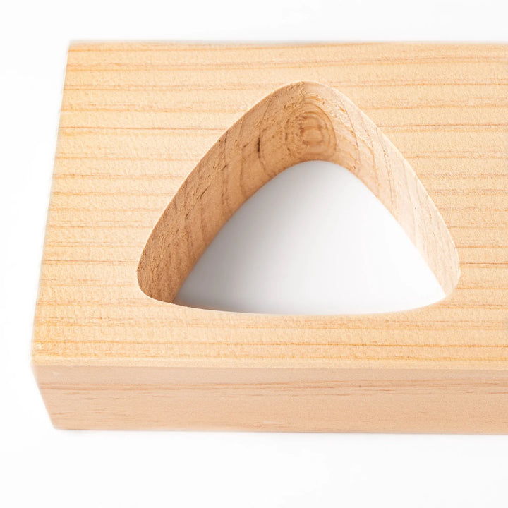 Hinoki wood onigiri mold with two triangle cavities and a matching lid, perfect for shaping traditional Japanese rice balls with ease and aroma.