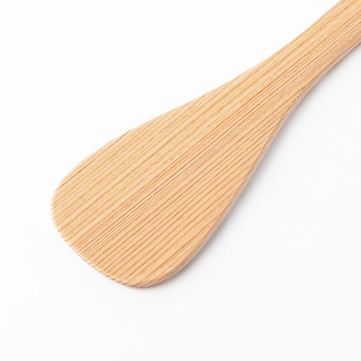 Lightweight spatula made from natural hinoki wood, featuring fine vertical grain and engraved Japanese characters on the handle for an authentic touch.