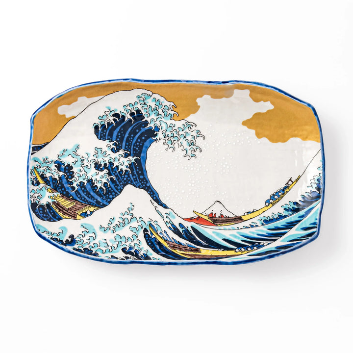 Rectangular serving plate featuring Hokusai’s Great Wave off Kanagawa, highlighted with vivid blue, gold, and white for a striking presentation.