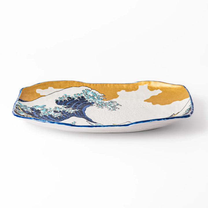 Rectangular serving plate featuring Hokusai’s Great Wave off Kanagawa, highlighted with vivid blue, gold, and white for a striking presentation.