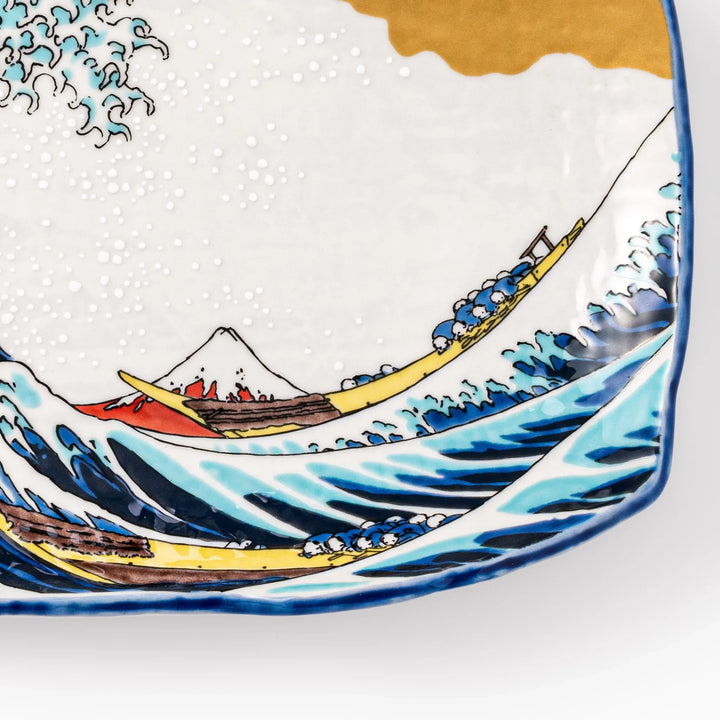Rectangular serving plate featuring Hokusai’s Great Wave off Kanagawa, highlighted with vivid blue, gold, and white for a striking presentation.