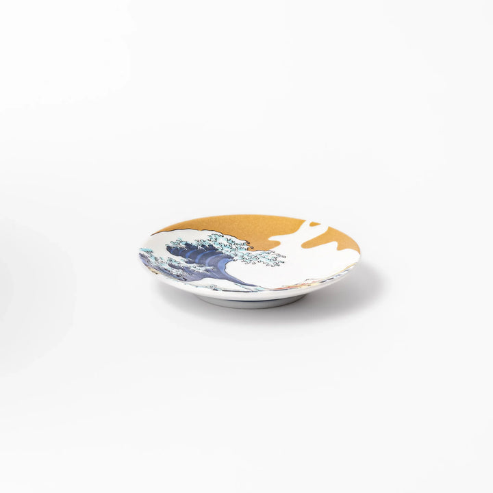 Round Japanese ceramic sauce dish featuring Hokusai’s Great Wave design with vivid blue waves, golden sky, and Mt. Fuji, perfect for soy sauce or condiments.