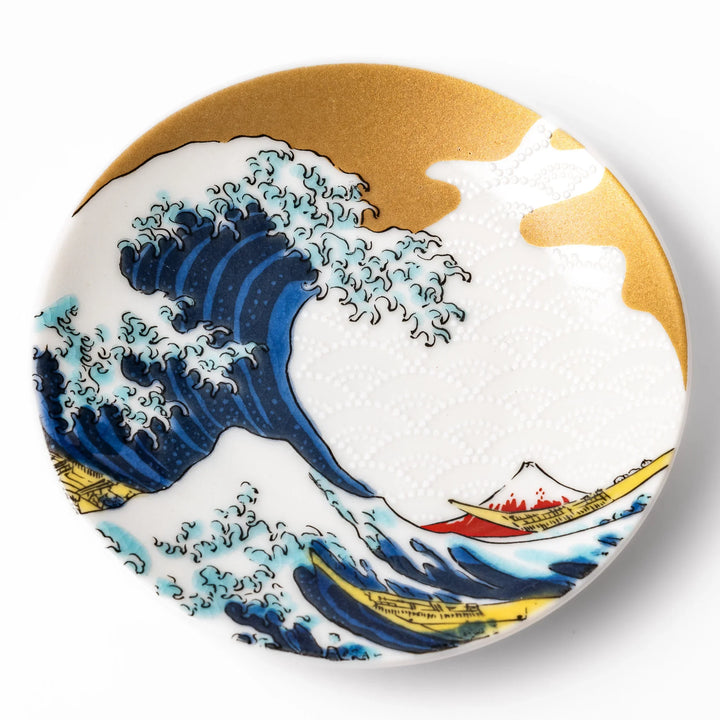 Round Japanese ceramic sauce dish featuring Hokusai’s Great Wave design with vivid blue waves, golden sky, and Mt. Fuji, perfect for soy sauce or condiments.