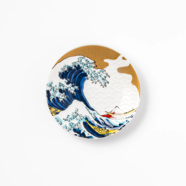 Round Japanese ceramic sauce dish featuring Hokusai’s Great Wave design with vivid blue waves, golden sky, and Mt. Fuji, perfect for soy sauce or condiments.