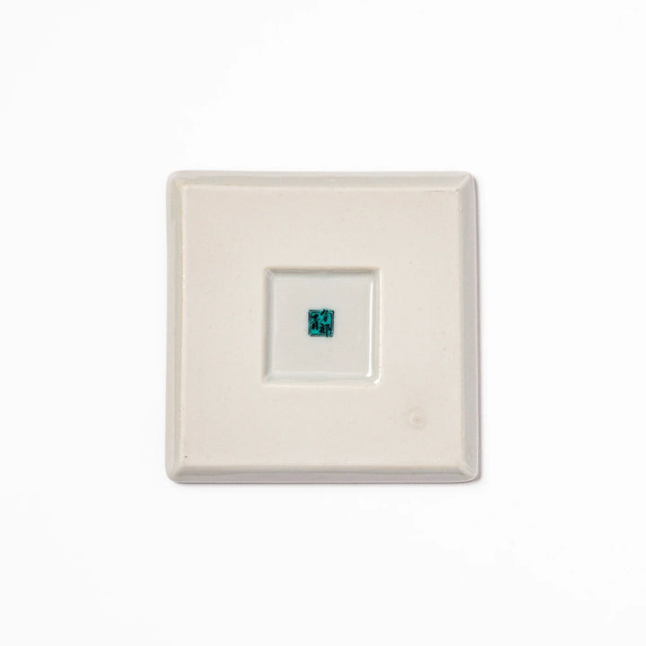 Square Japanese ceramic coaster featuring Hokusai’s Red Fuji design with vivid red mountain, blue sky, and clouds, adding iconic artistry to dining tables.