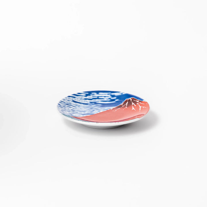 Round Japanese ceramic sauce dish featuring Hokusai’s iconic Red Fuji design with vivid red mountain, blue sky, and clouds, perfect for soy sauce or condiments.