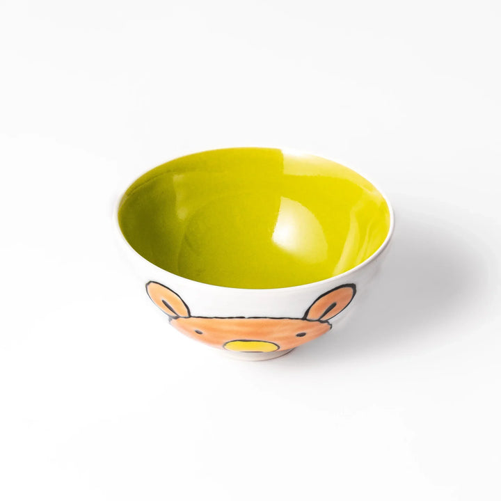 White ceramic kids rice bowl featuring honey bear face, chartreuse interior, round footed base