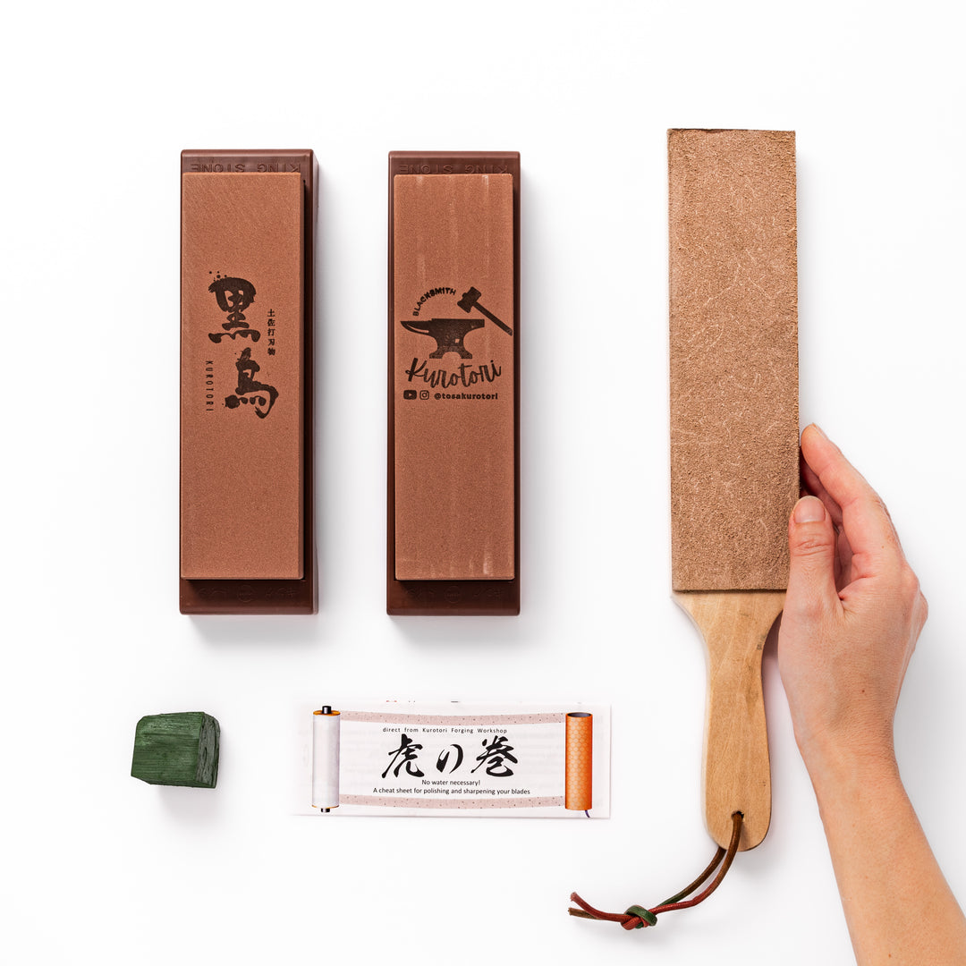 Japanese knife maintenance kit with whetstones leather strop and polishing compound designed for sharpening and honing blades.