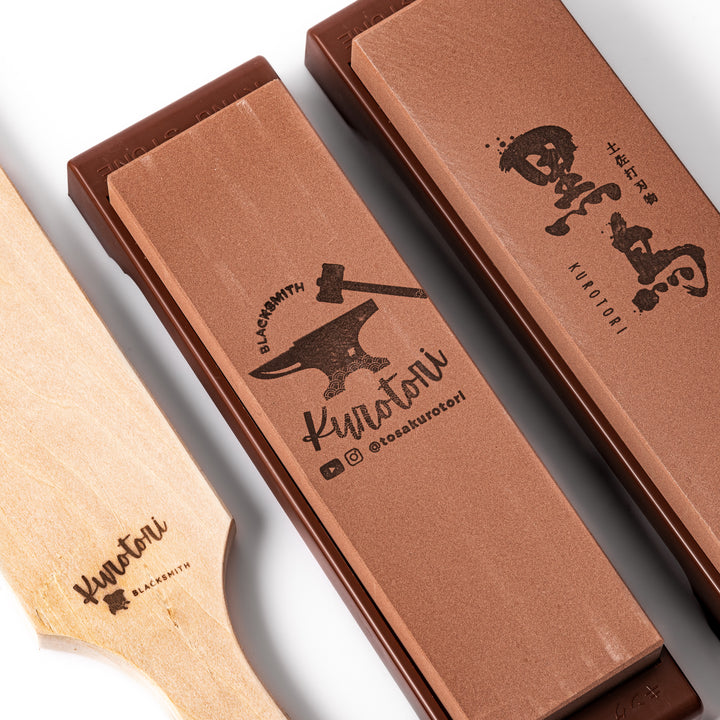 Japanese knife maintenance kit with whetstones leather strop and polishing compound designed for sharpening and honing blades.