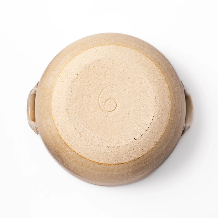 Japanese donabe clay pot with misty beige glazed lid and handles, family-size design ideal for hot pot and slow cooking meals.