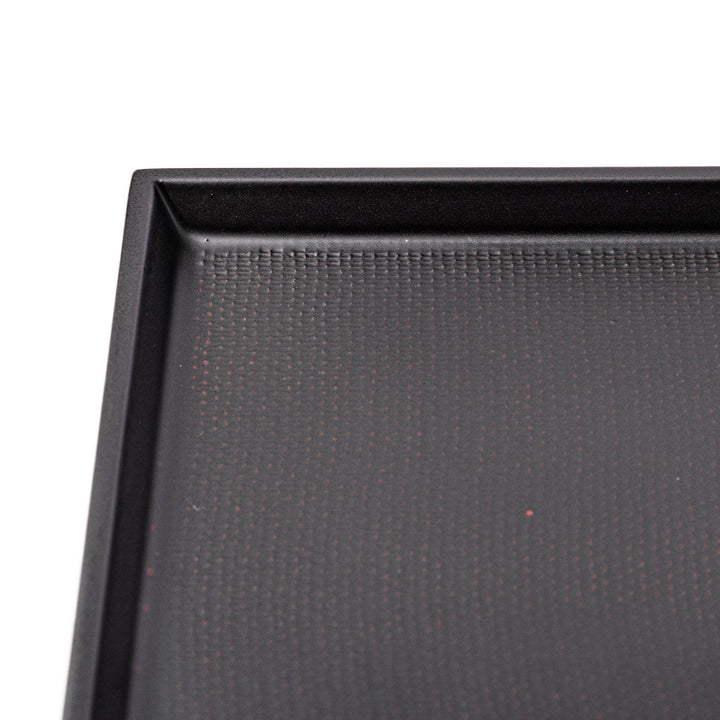 Modern Japanese Lacquer Serving Tray in sleek black with a textured horizontal grain pattern and subtle side grooves for easy handling.