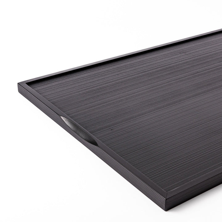 Modern Japanese Lacquer Serving Tray in sleek black with a textured horizontal grain pattern and subtle side grooves for easy handling.