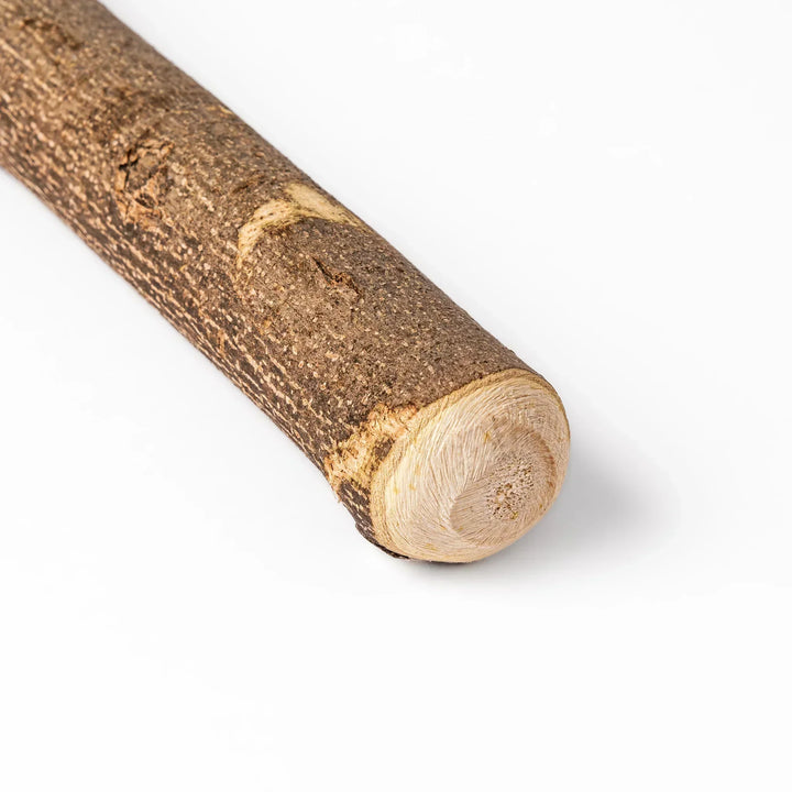 Natural sansho wood pestle featuring bark textures and a burgundy hanging cord, ideal for traditional Japanese grinding.