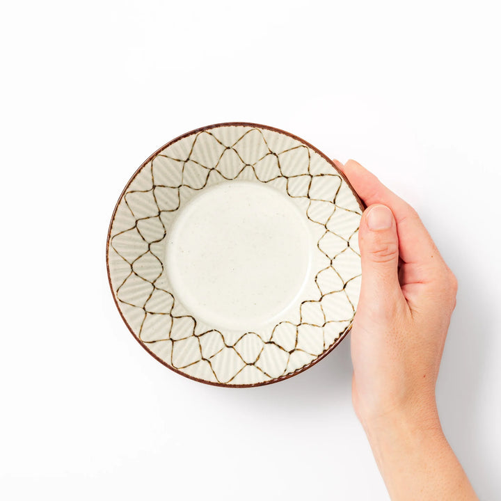 Japanese ceramic cereal bowl with rustic diamond weave pattern and earthy brown rim, perfect for breakfast or everyday dining