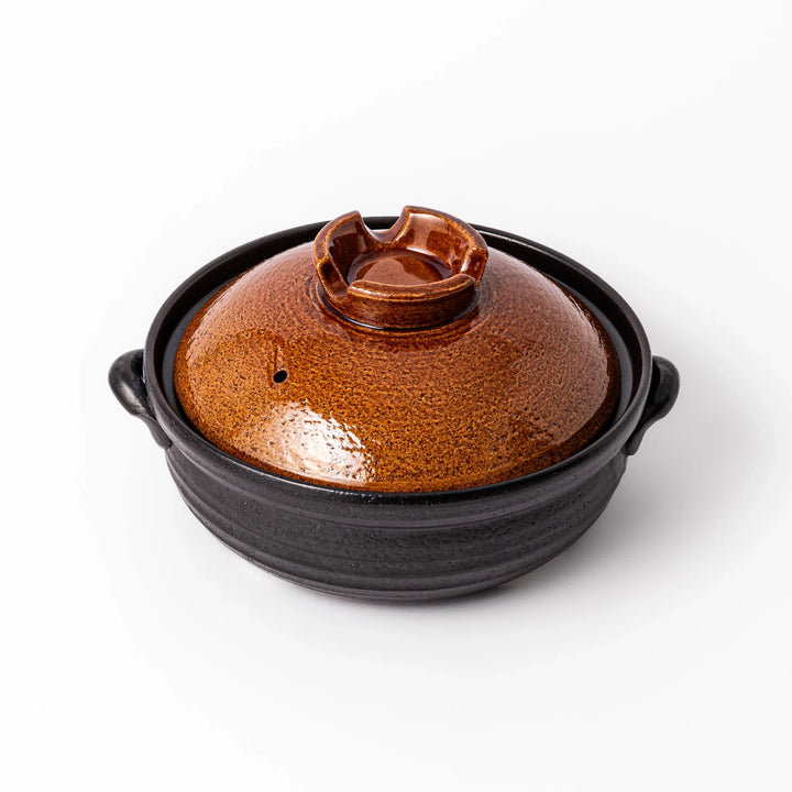 Japanese donabe clay pot with rustic brown glazed lid and black base, induction compatible and ideal for 2–3 person hot pot meals
