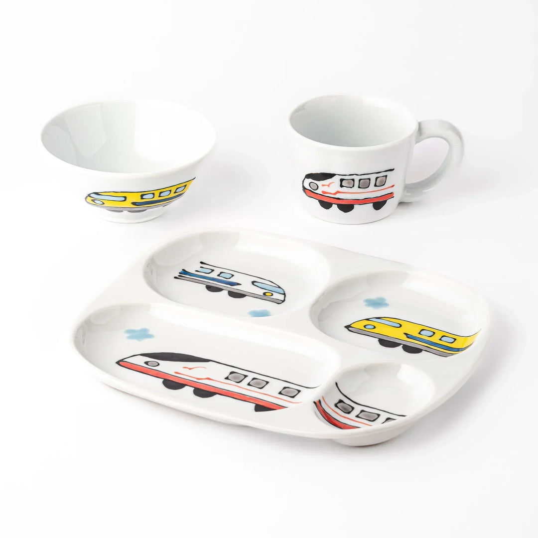 White ceramic kids mug, divided plate and rice bowl set featuring Shinkansen bullet train graphics and blue cloud accents