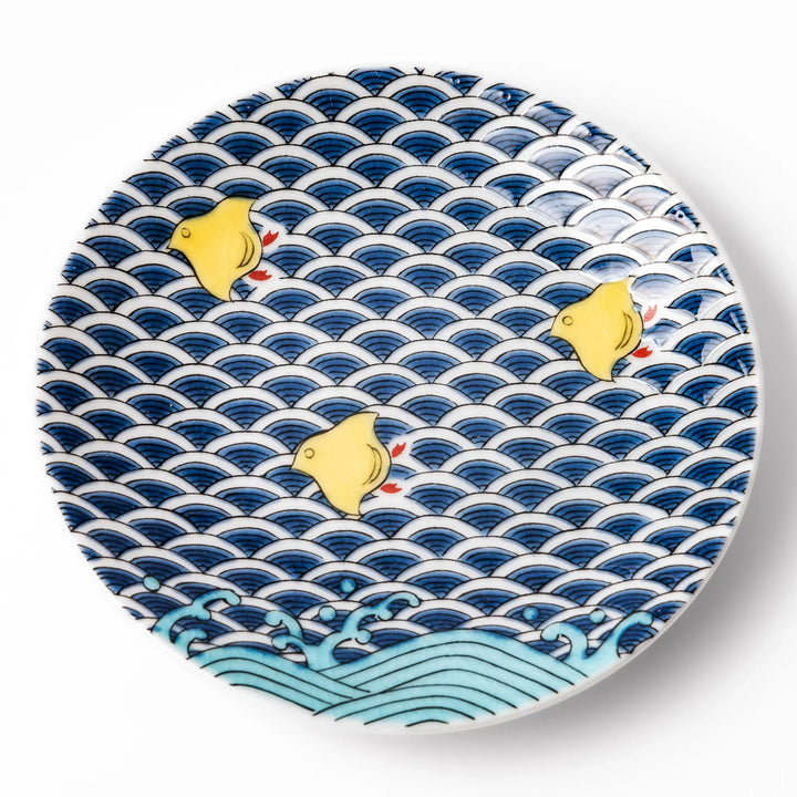 Round Japanese ceramic sauce dish with traditional blue wave pattern and playful yellow shorebirds, perfect for serving soy sauce, condiments, or appetizers.