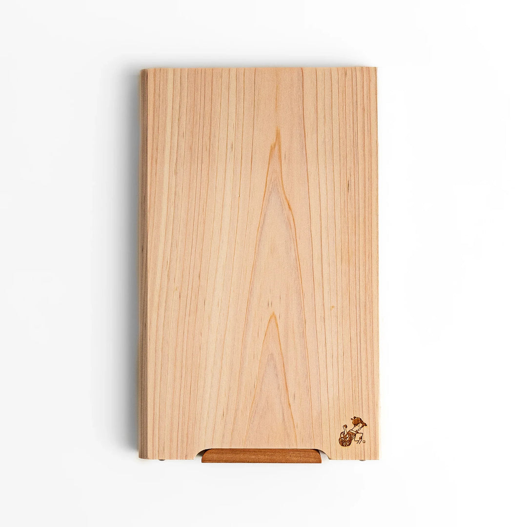 Small Hinoki wood cutting board with smooth grain, natural finish, corner handle, and engraved motif, crafted in Japan