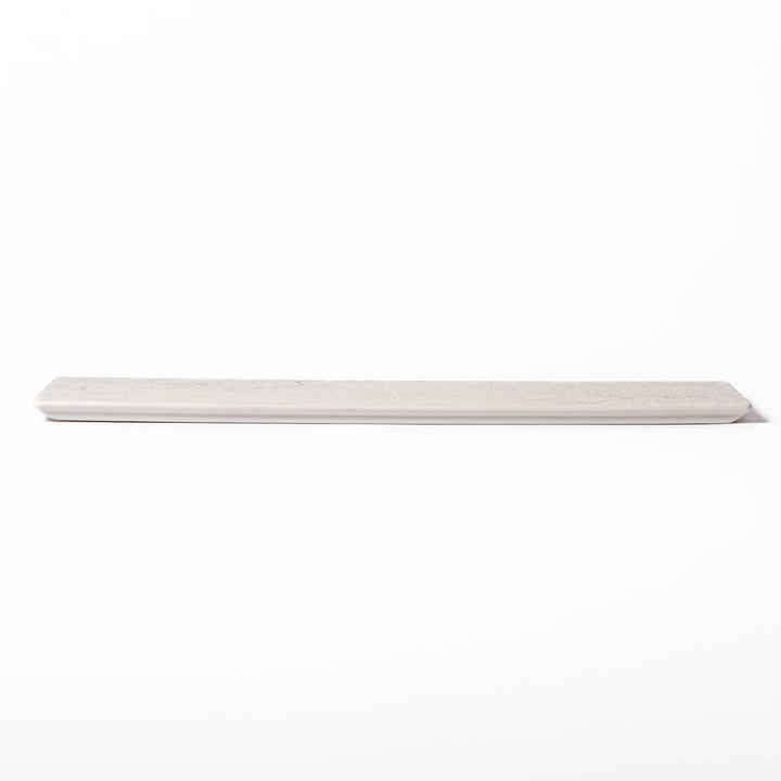 Rectangular white ceramic serving plate with fine ridged texture and soft matte-gloss contrast, ideal for modern Japanese table presentations.