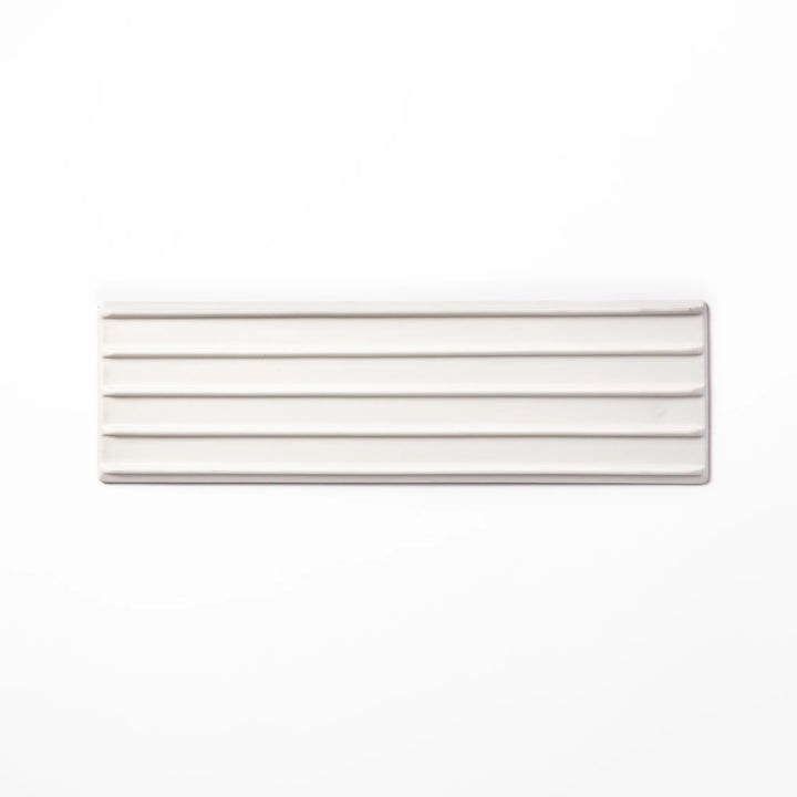 Rectangular white ceramic serving plate with fine ridged texture and soft matte-gloss contrast, ideal for modern Japanese table presentations.